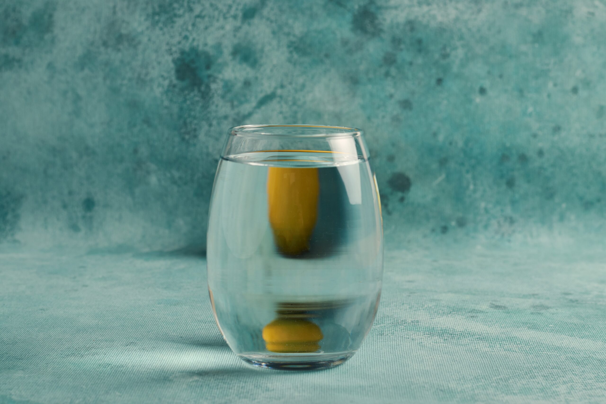 closeup shot of a glass of water on a blue backgro 2025 02 09 01 30 51 utc scaled