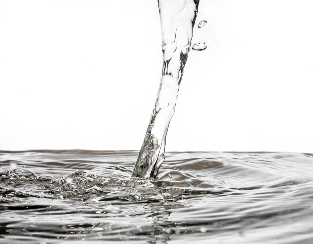 close up of pouring water on water surface backgro 2025 02 22 08 33 36 utc 1
