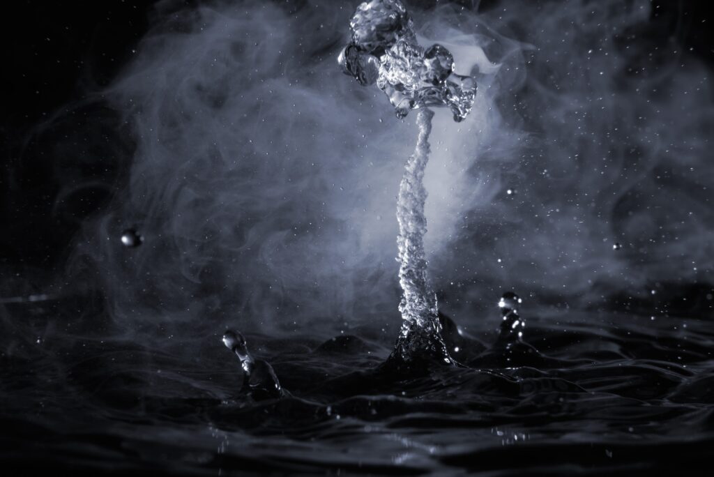 boiling water splash with steam on black backgroun 2025 03 13 22 35 28 utc 1
