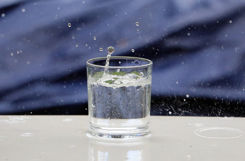 closeup shot of a glass of water with splashing dr 2025 02 11 17 41 39 utc